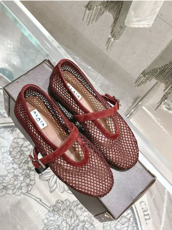 UA ALAÏA BALLET FLATS IN FISHNET