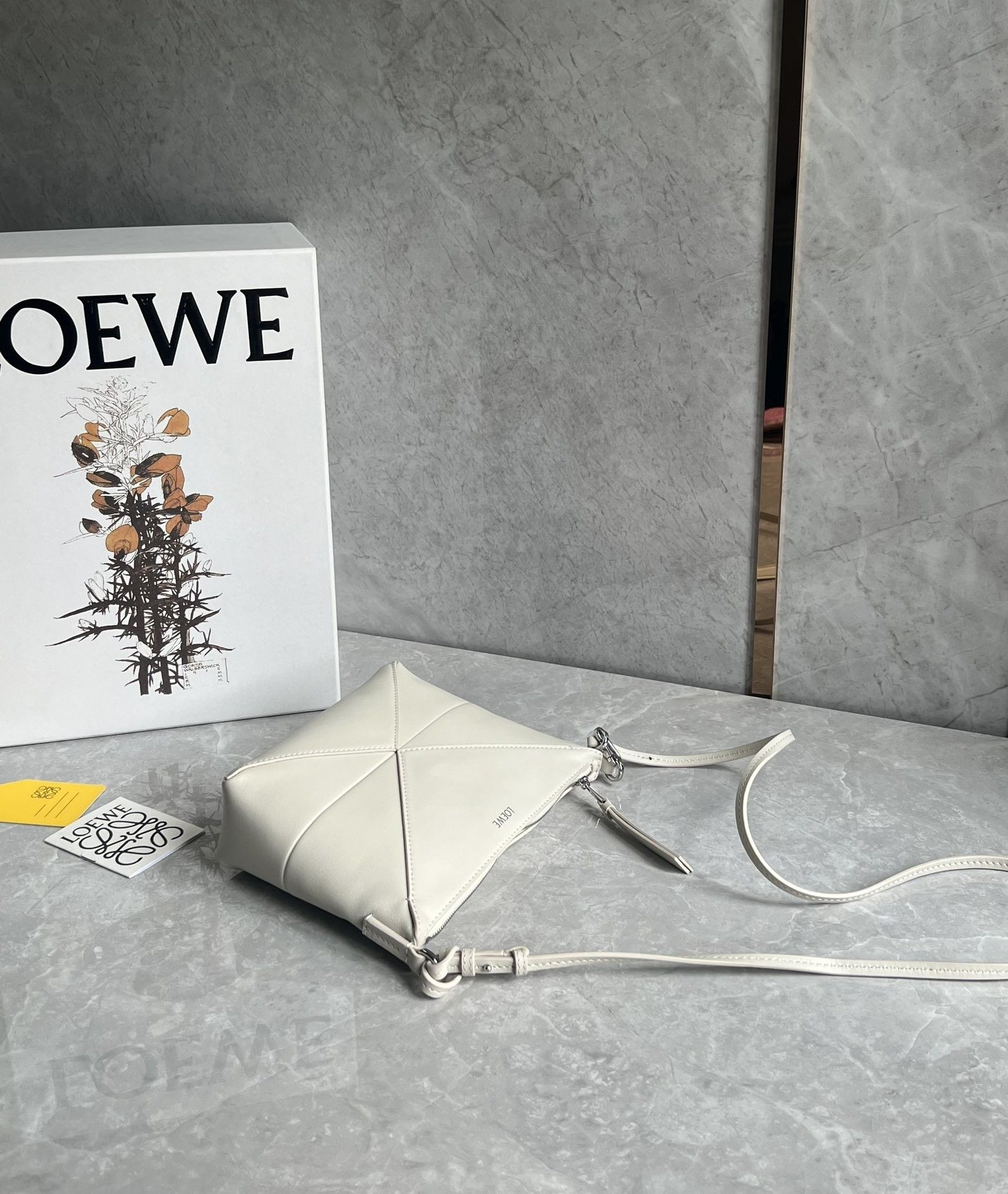 L0ew* puzzle fold pouch in shiny nappa calfskin 15.5x23x6.5cm