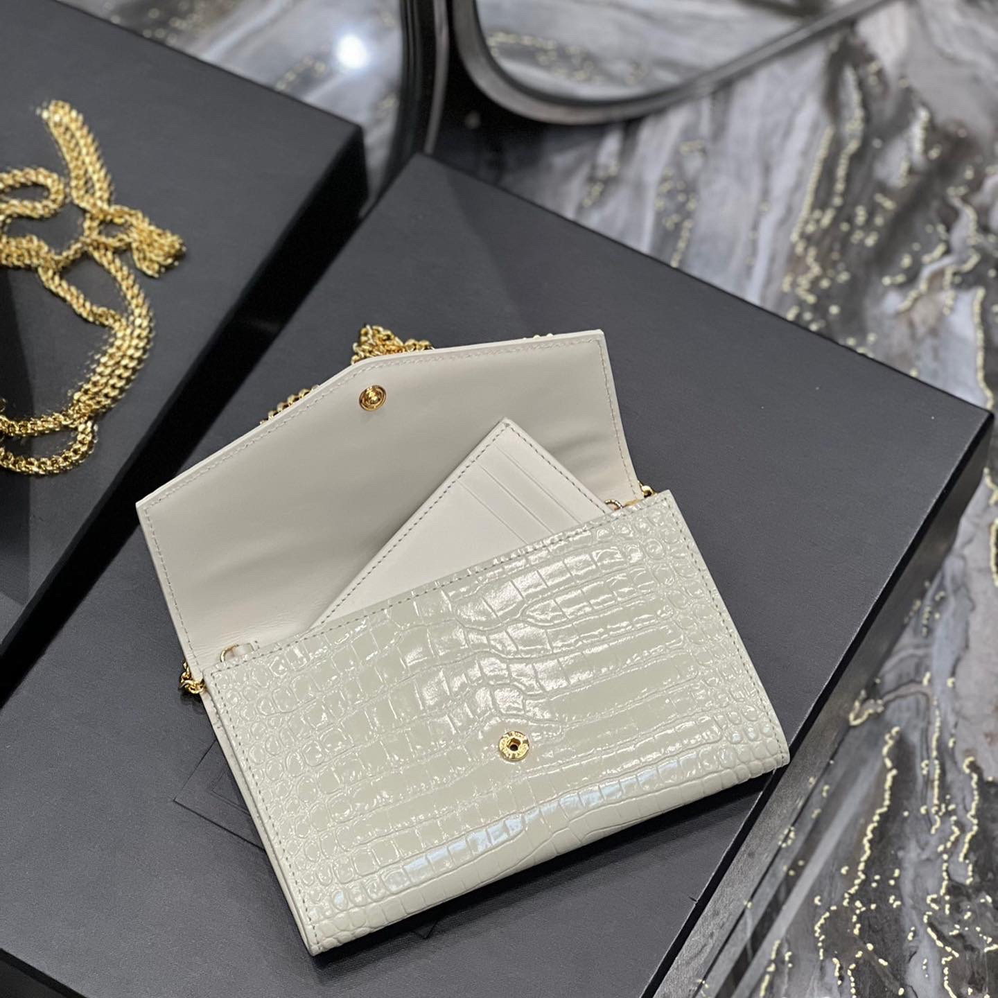 UPTOWN CHAIN WALLET IN CROCODILE-EMBOSSED SHINY LEATHER