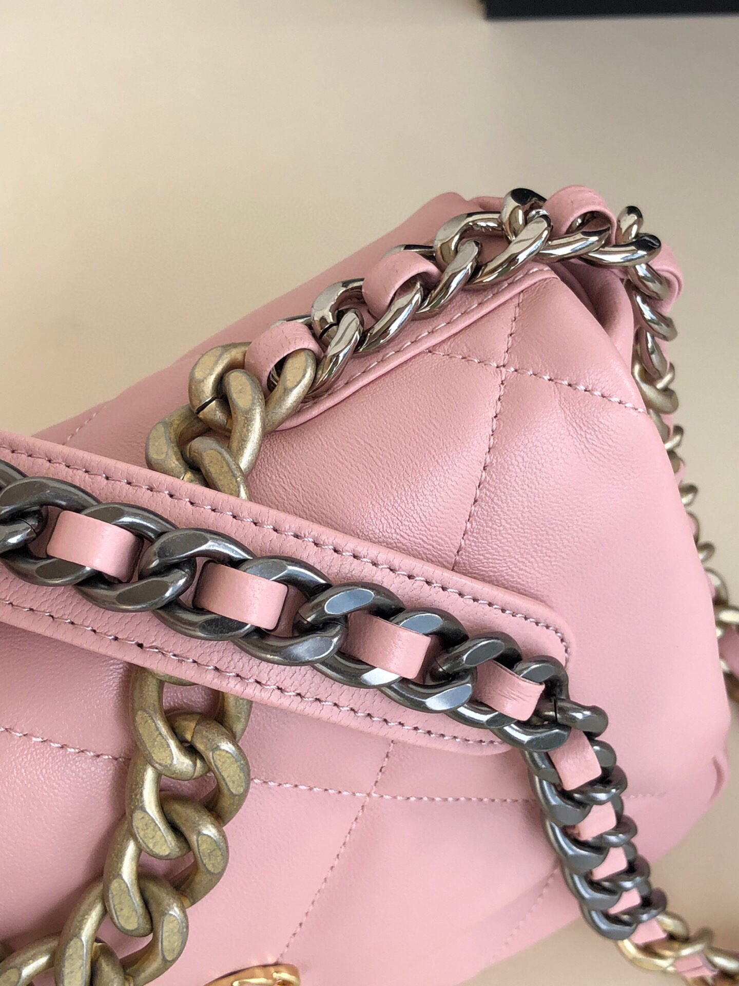 Ch*el 19 handbag shiny leather, gold-tone, silver-tone & ruthenium-finish metal light pink 6.2 × 10.1 × 3.5 in