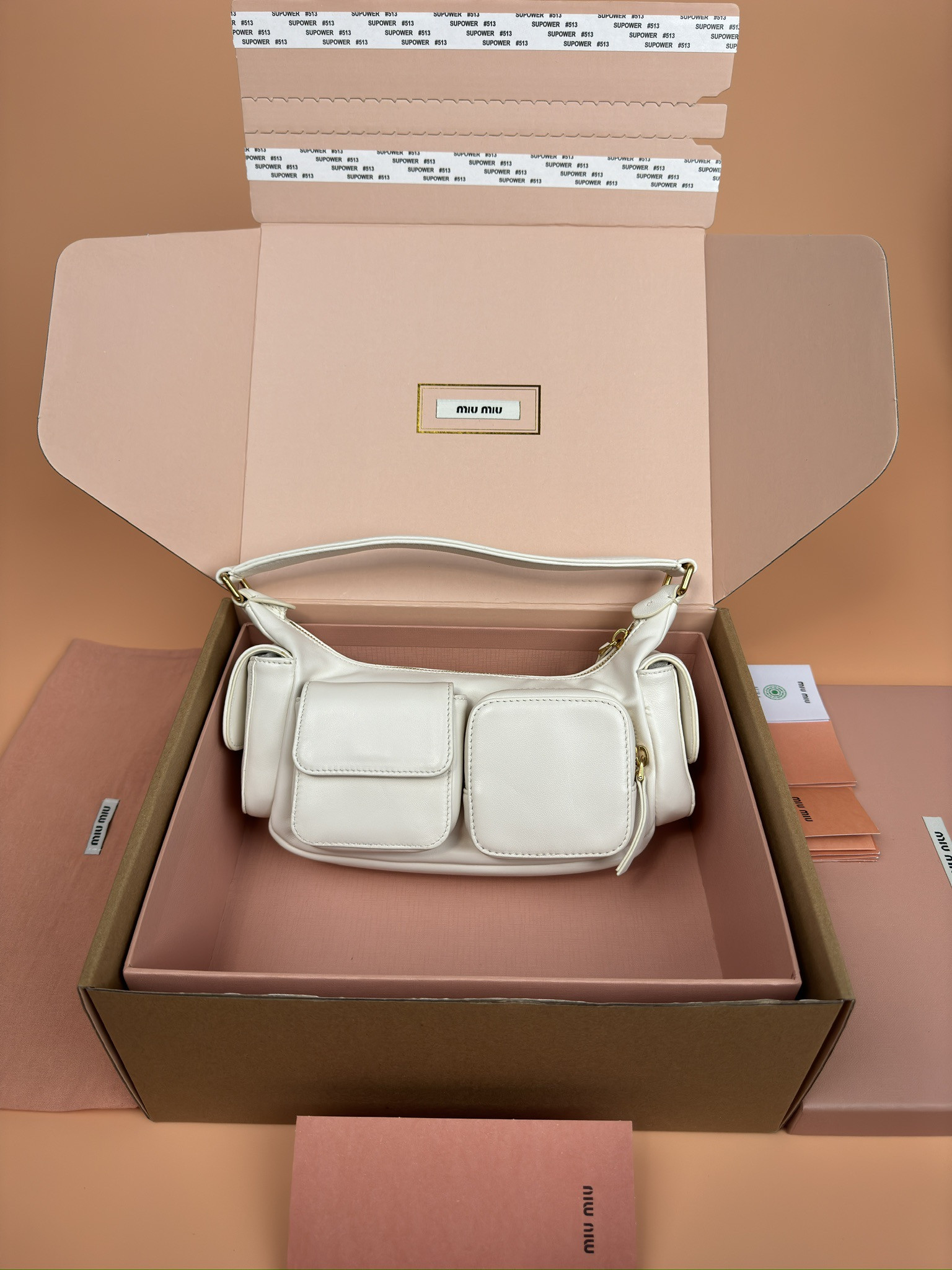 Miu Miu Hobo Nappa leather pocket bag  12x21x6cm