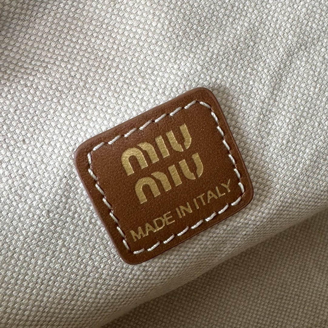 Miu Miu Jacquard fabric pouch with logo 14x18.5x10cm